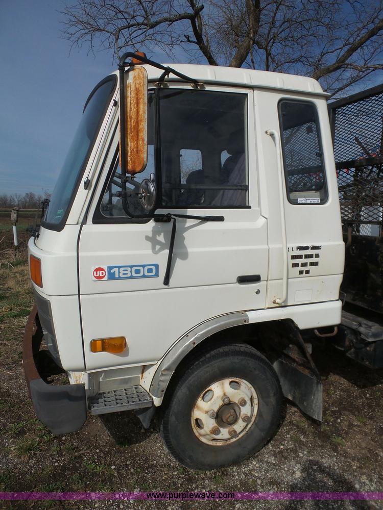 image for item BH9371 1992 Nissan truck and Landoll trailer