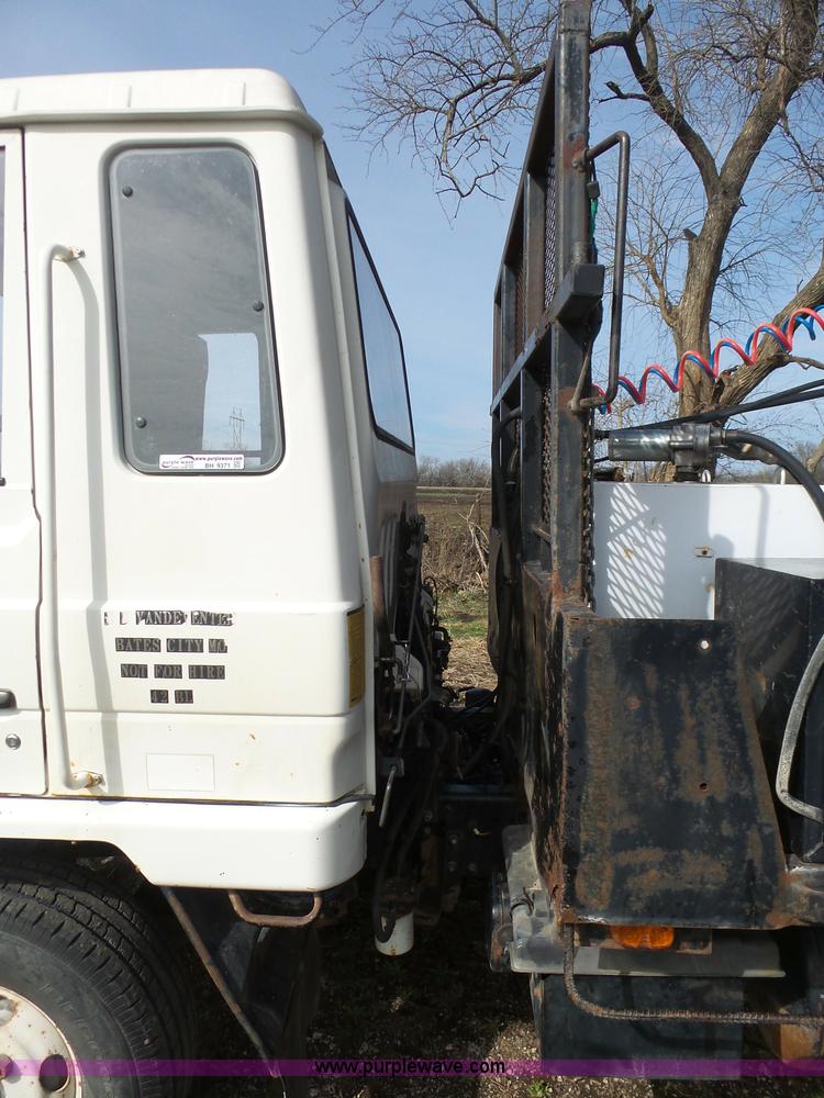 image for item BH9371 1992 Nissan truck and Landoll trailer