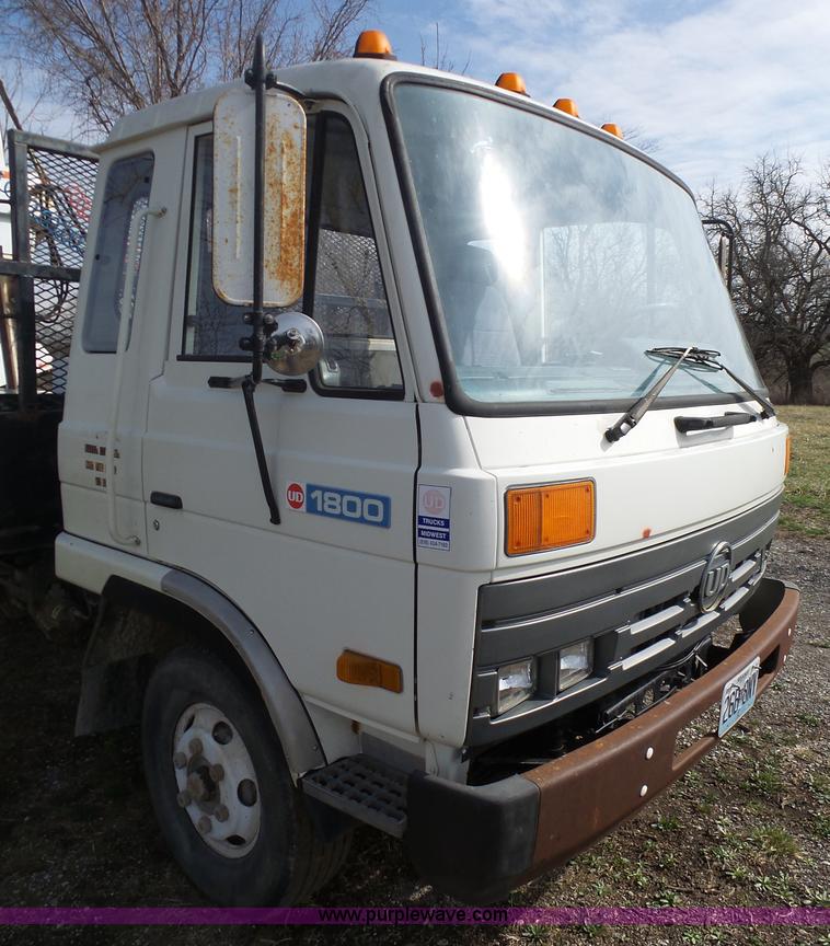 image for item BH9371 1992 Nissan truck and Landoll trailer