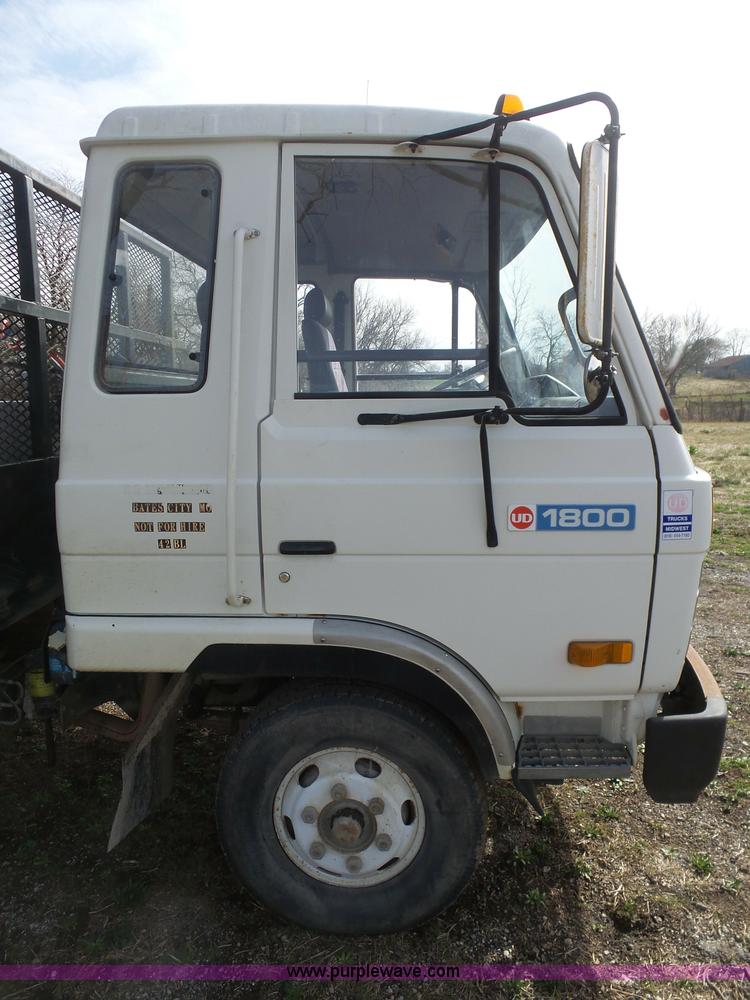 image for item BH9371 1992 Nissan truck and Landoll trailer