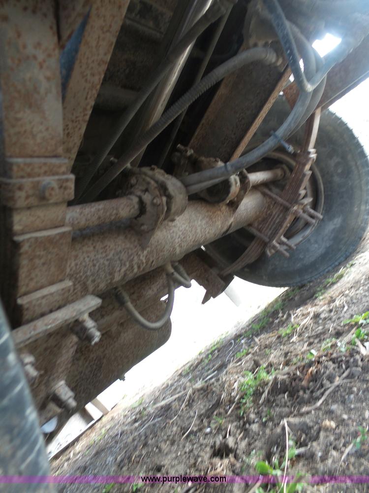 image for item BH9371 1992 Nissan truck and Landoll trailer