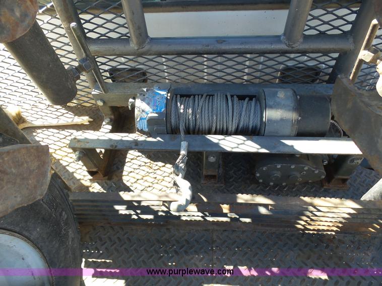 image for item J6759 2007 Ford F450 Super Duty flatbed truck