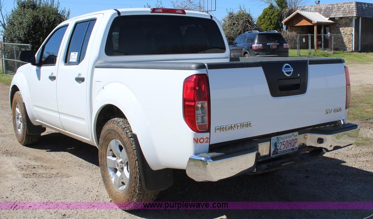image for item J7546 2012 Nissan Frontier Crew Cab pickup truck