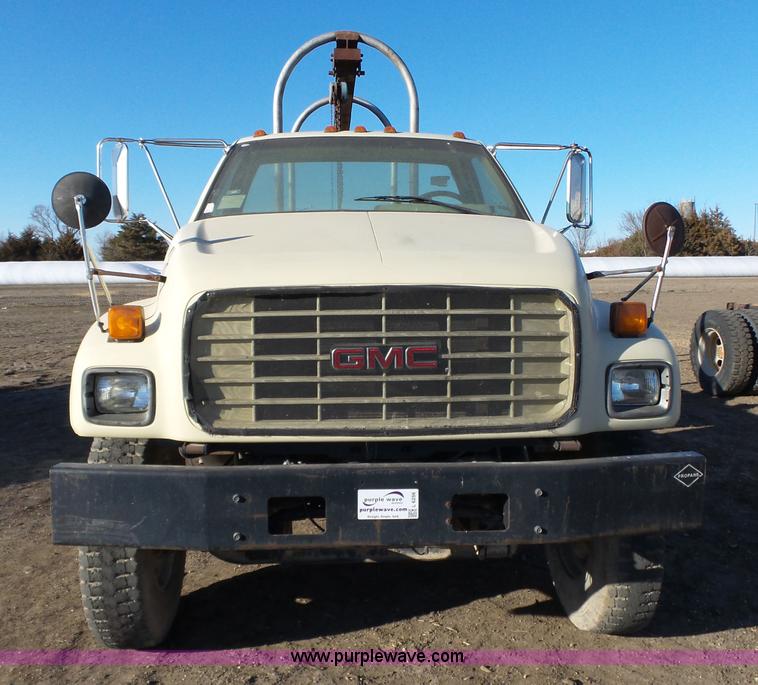 image for item L6256 1999 GMC C7500 flatbed truck