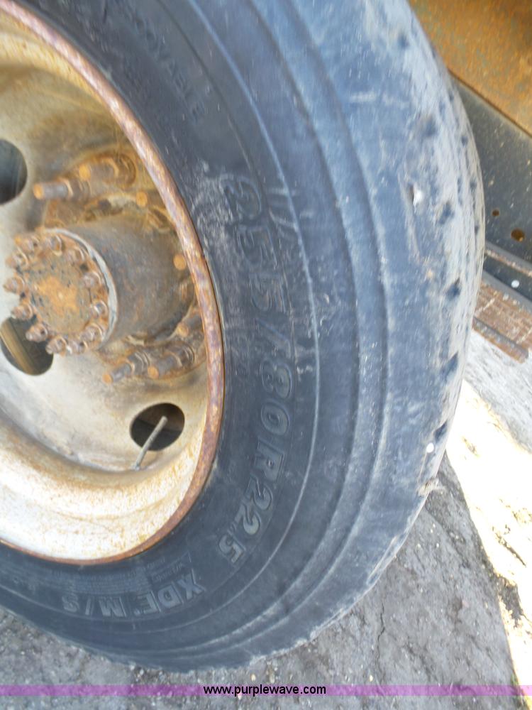 image for item L6256 1999 GMC C7500 flatbed truck