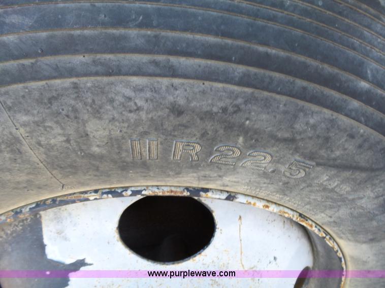 image for item L6256 1999 GMC C7500 flatbed truck