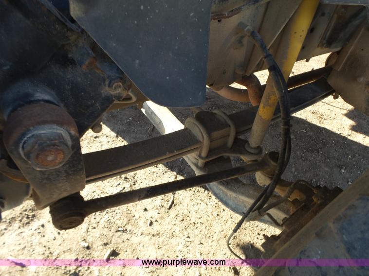 image for item L6256 1999 GMC C7500 flatbed truck