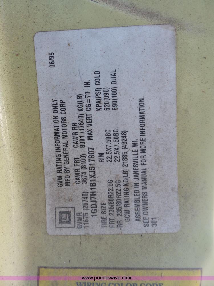 image for item L6256 1999 GMC C7500 flatbed truck