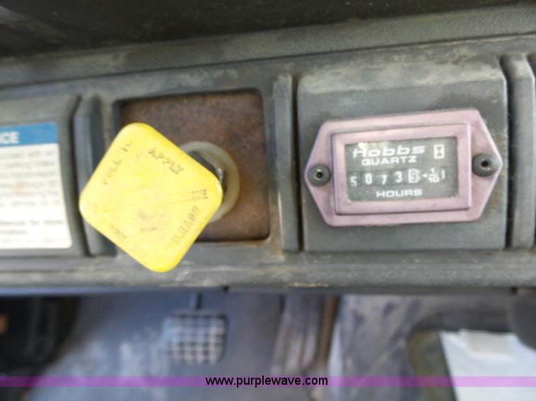 image for item L6256 1999 GMC C7500 flatbed truck