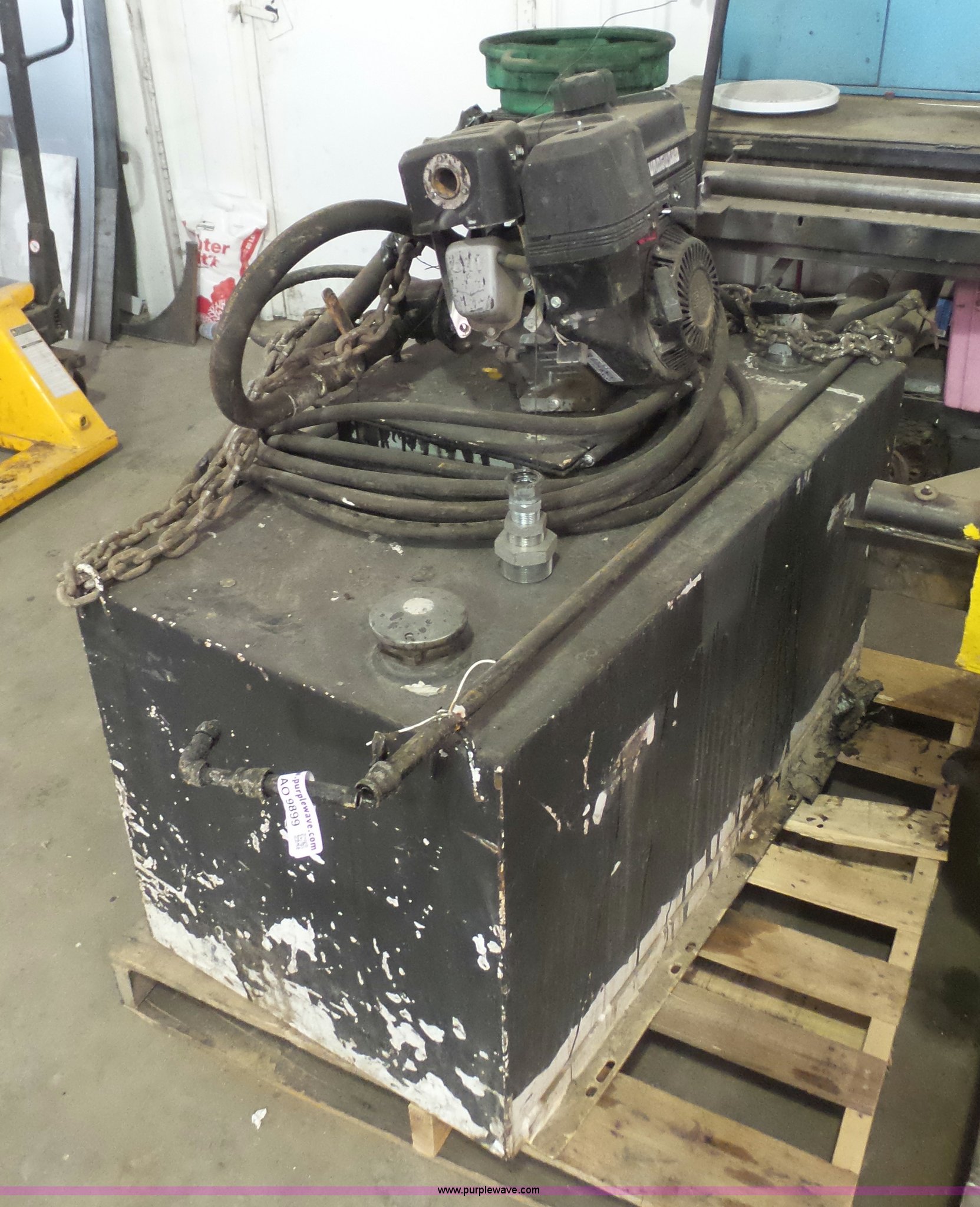 Asphalt sealer pumping tank in Goodland, KS Item AO9899 sold Purple