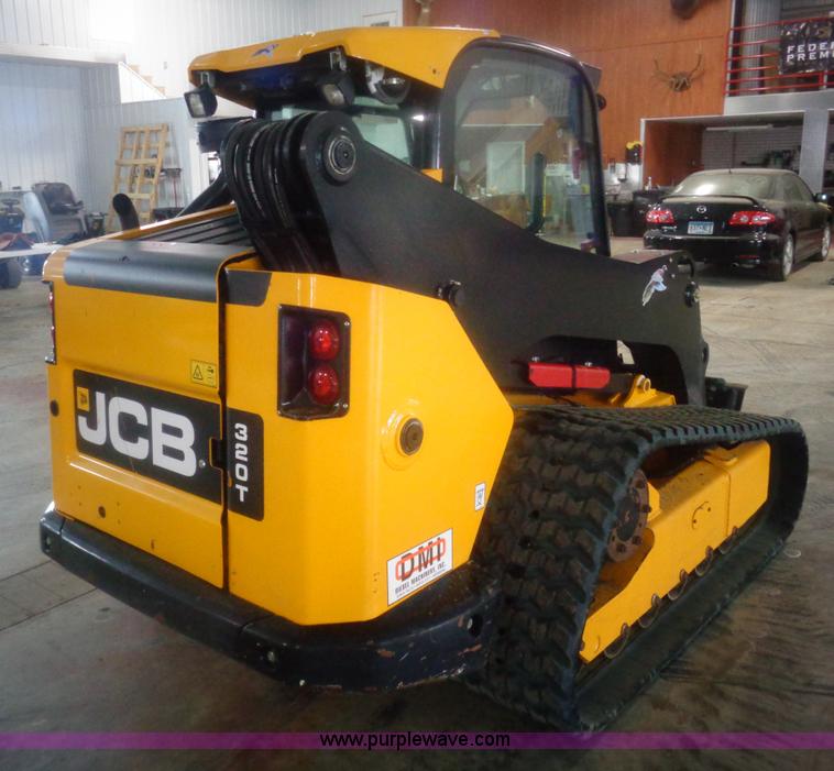 image for item AL9226 2013 JCB 320T skid steer
