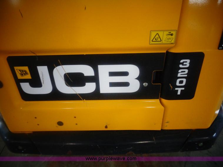 image for item AL9226 2013 JCB 320T skid steer