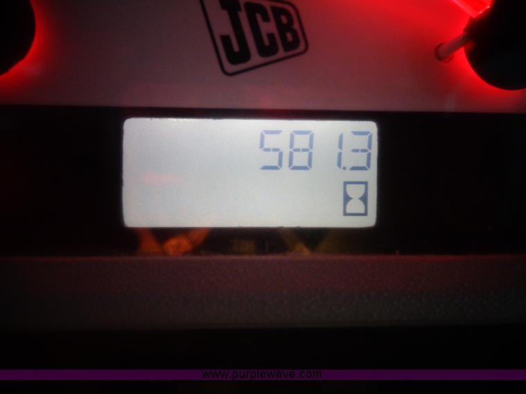 image for item AL9226 2013 JCB 320T skid steer