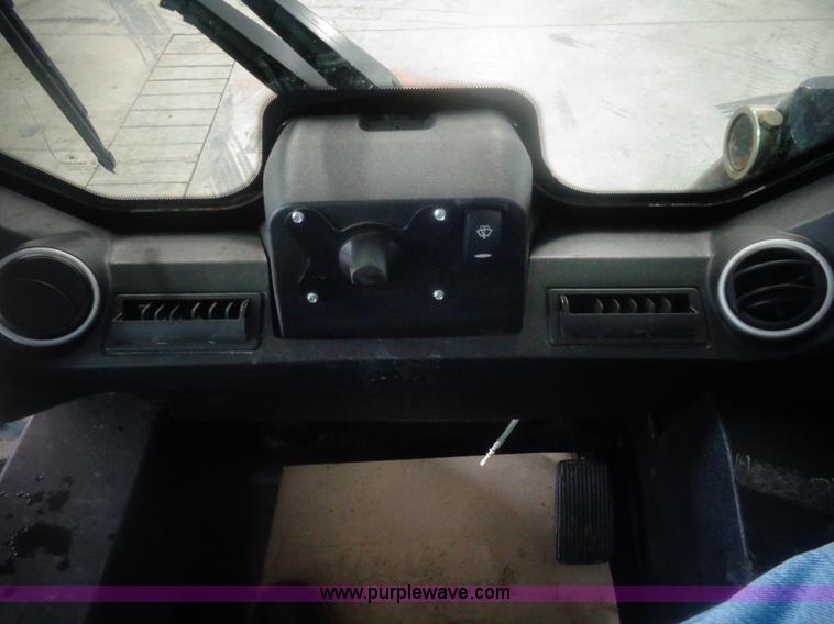 image for item AL9226 2013 JCB 320T skid steer