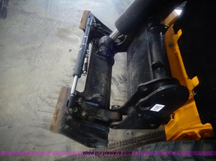 image for item AL9226 2013 JCB 320T skid steer