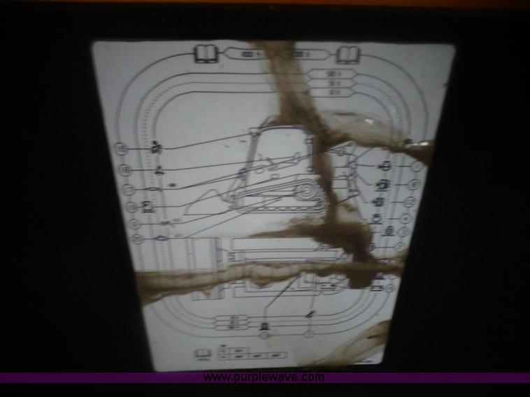 image for item AL9226 2013 JCB 320T skid steer