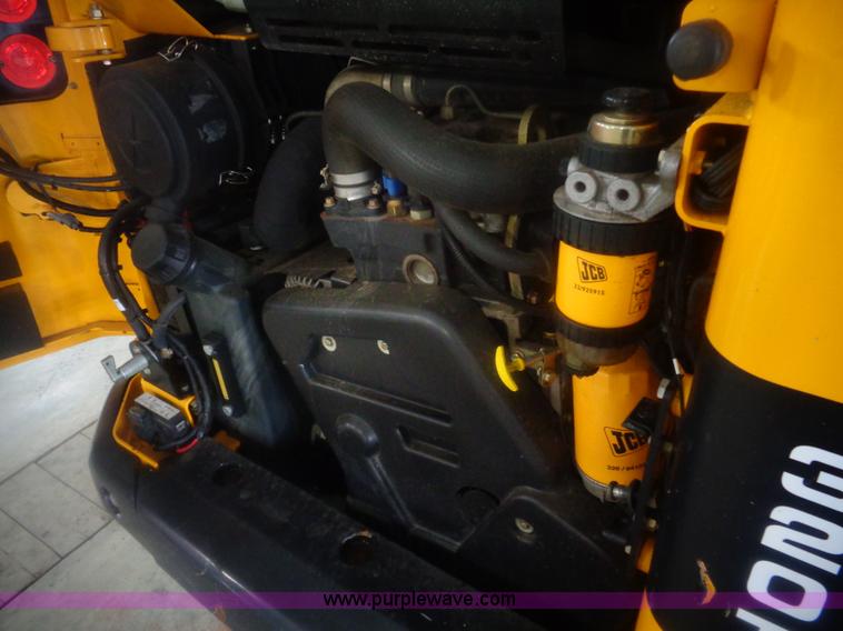 image for item AL9226 2013 JCB 320T skid steer