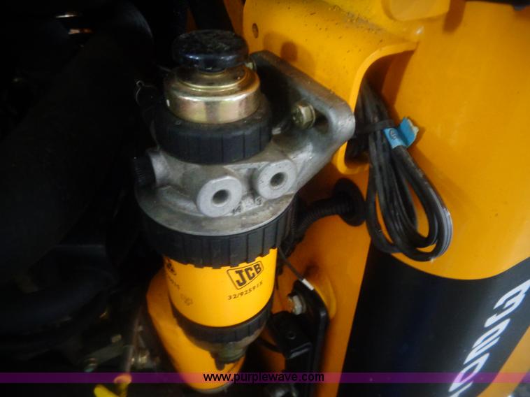 image for item AL9226 2013 JCB 320T skid steer