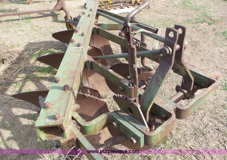 image for item AV9832 John Deere four bottom plow
