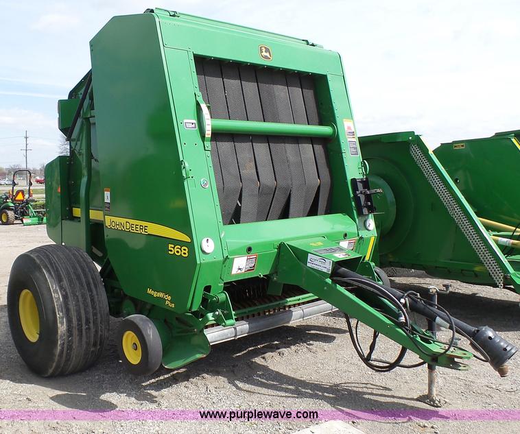 image for item L1328 2010 John Deere 568 Mega Wide Plus round baler