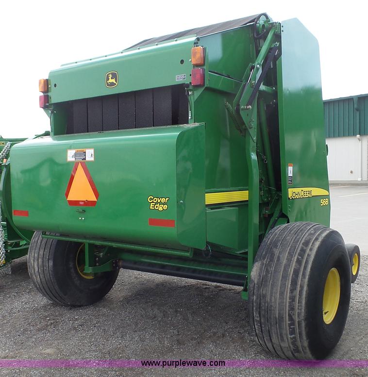 image for item L1328 2010 John Deere 568 Mega Wide Plus round baler