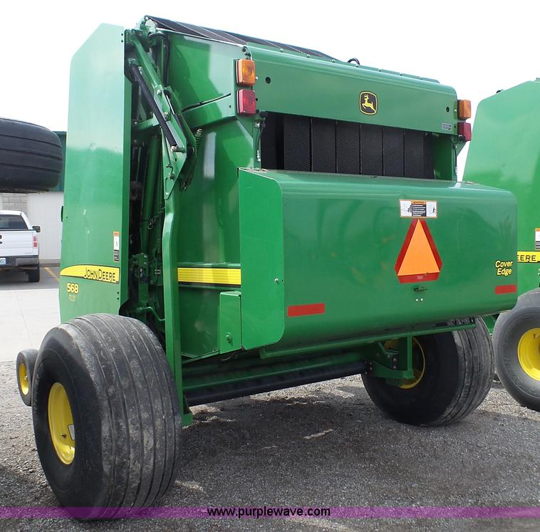image for item L1328 2010 John Deere 568 Mega Wide Plus round baler