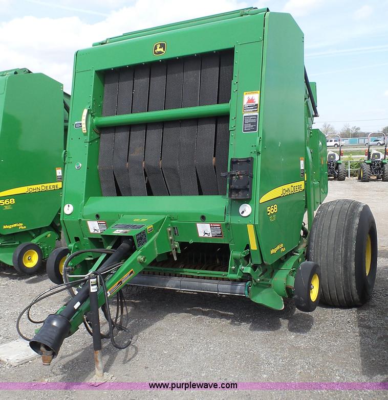 image for item L1328 2010 John Deere 568 Mega Wide Plus round baler