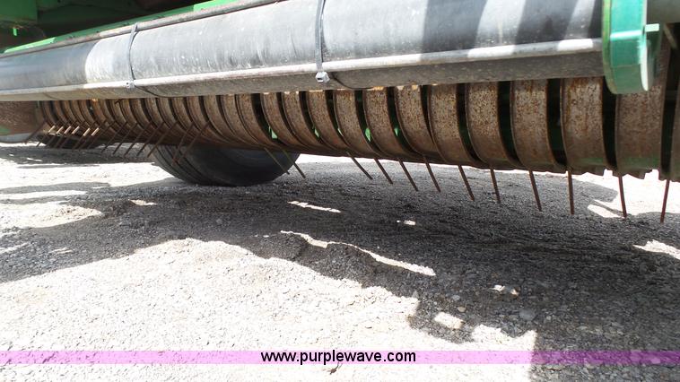 image for item L1328 2010 John Deere 568 Mega Wide Plus round baler