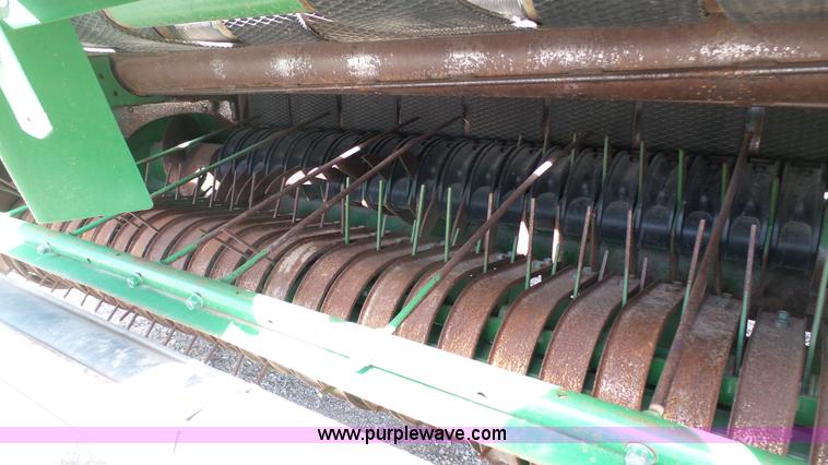 image for item L1328 2010 John Deere 568 Mega Wide Plus round baler