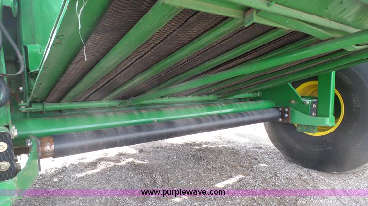 image for item L1328 2010 John Deere 568 Mega Wide Plus round baler