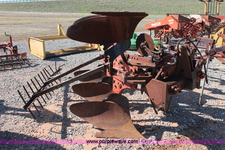 image for item L6865 International Harvester three bottom rollover plow