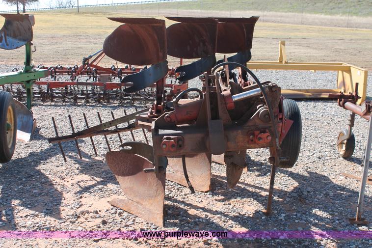 image for item L6865 International Harvester three bottom rollover plow