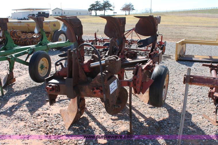 image for item L6865 International Harvester three bottom rollover plow