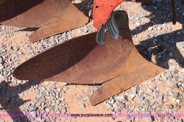 image for item L6865 International Harvester three bottom rollover plow