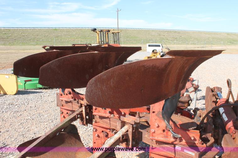 image for item L6865 International Harvester three bottom rollover plow