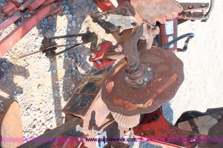 image for item L6865 International Harvester three bottom rollover plow