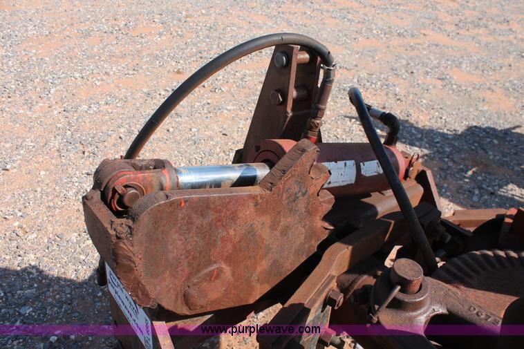 image for item L6865 International Harvester three bottom rollover plow
