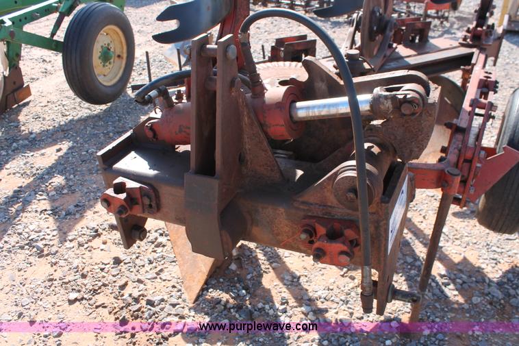 image for item L6865 International Harvester three bottom rollover plow