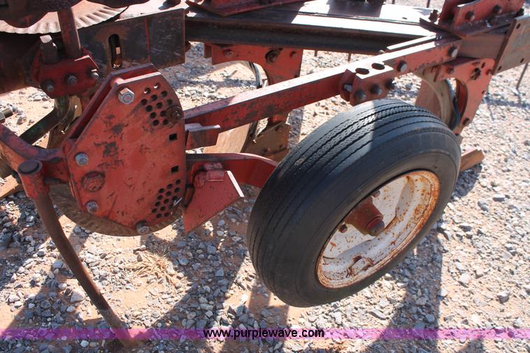 image for item L6865 International Harvester three bottom rollover plow