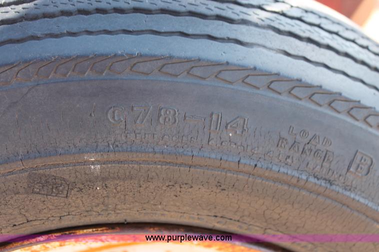 image for item L6865 International Harvester three bottom rollover plow