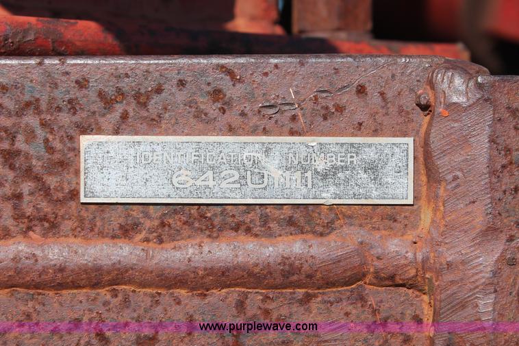 image for item L6865 International Harvester three bottom rollover plow