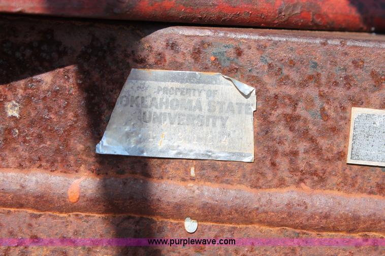 image for item L6865 International Harvester three bottom rollover plow
