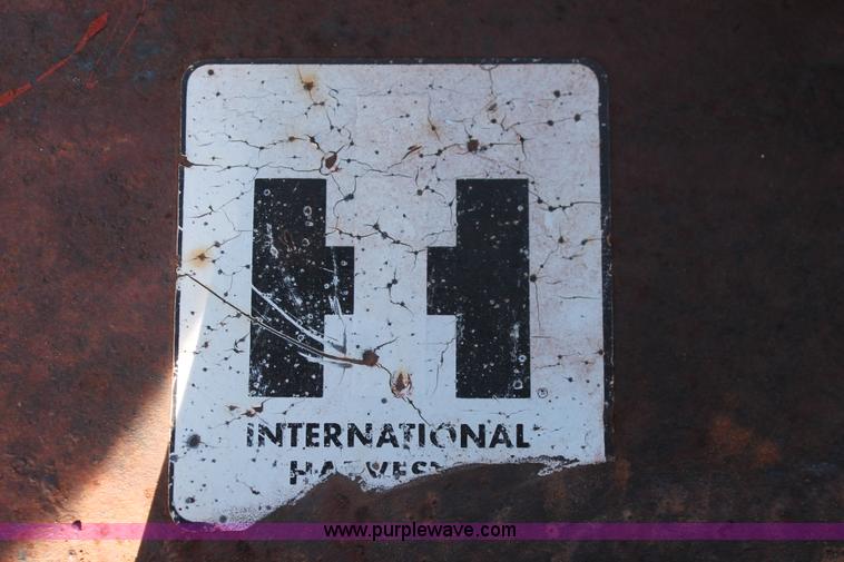 image for item L6865 International Harvester three bottom rollover plow