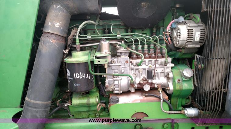 image for item L7315 1993 John Deere 4960 MFWD tractor