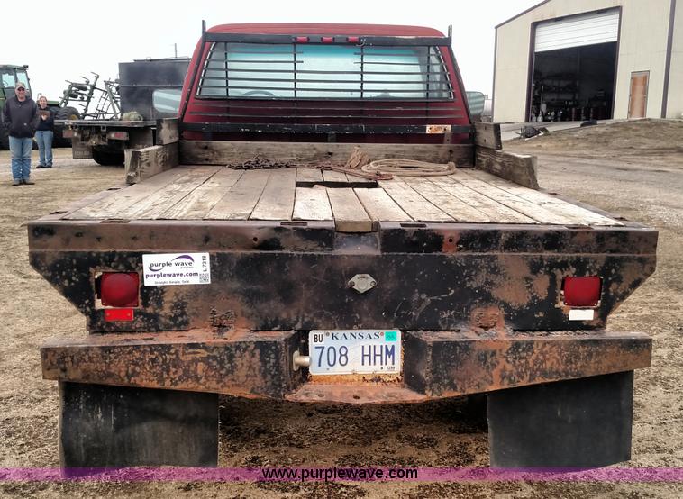 image for item L7318 1984 Chevrolet Silverado C10 flatbed pickup truck