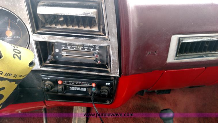 image for item L7318 1984 Chevrolet Silverado C10 flatbed pickup truck