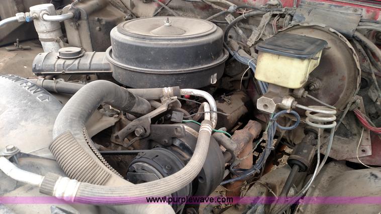 image for item L7318 1984 Chevrolet Silverado C10 flatbed pickup truck