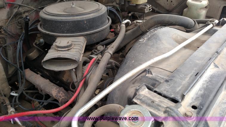 image for item L7318 1984 Chevrolet Silverado C10 flatbed pickup truck