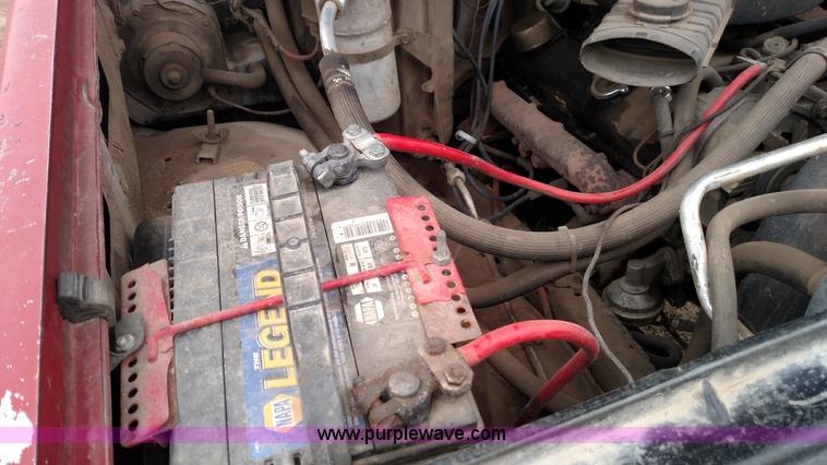 image for item L7318 1984 Chevrolet Silverado C10 flatbed pickup truck