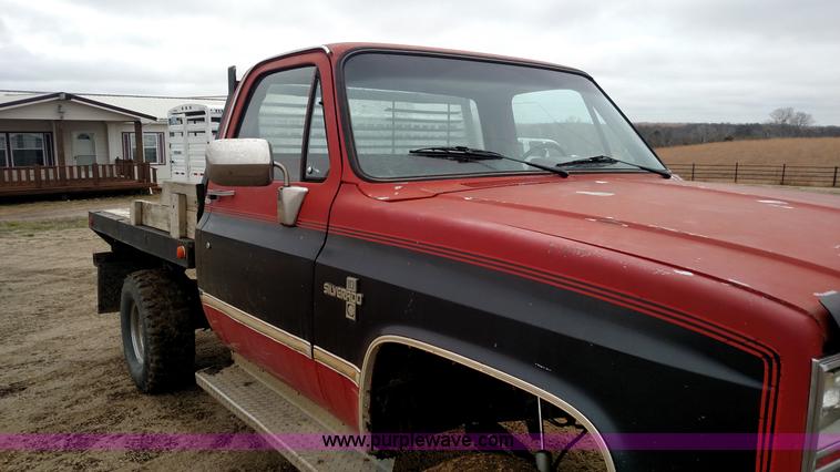 image for item L7318 1984 Chevrolet Silverado C10 flatbed pickup truck